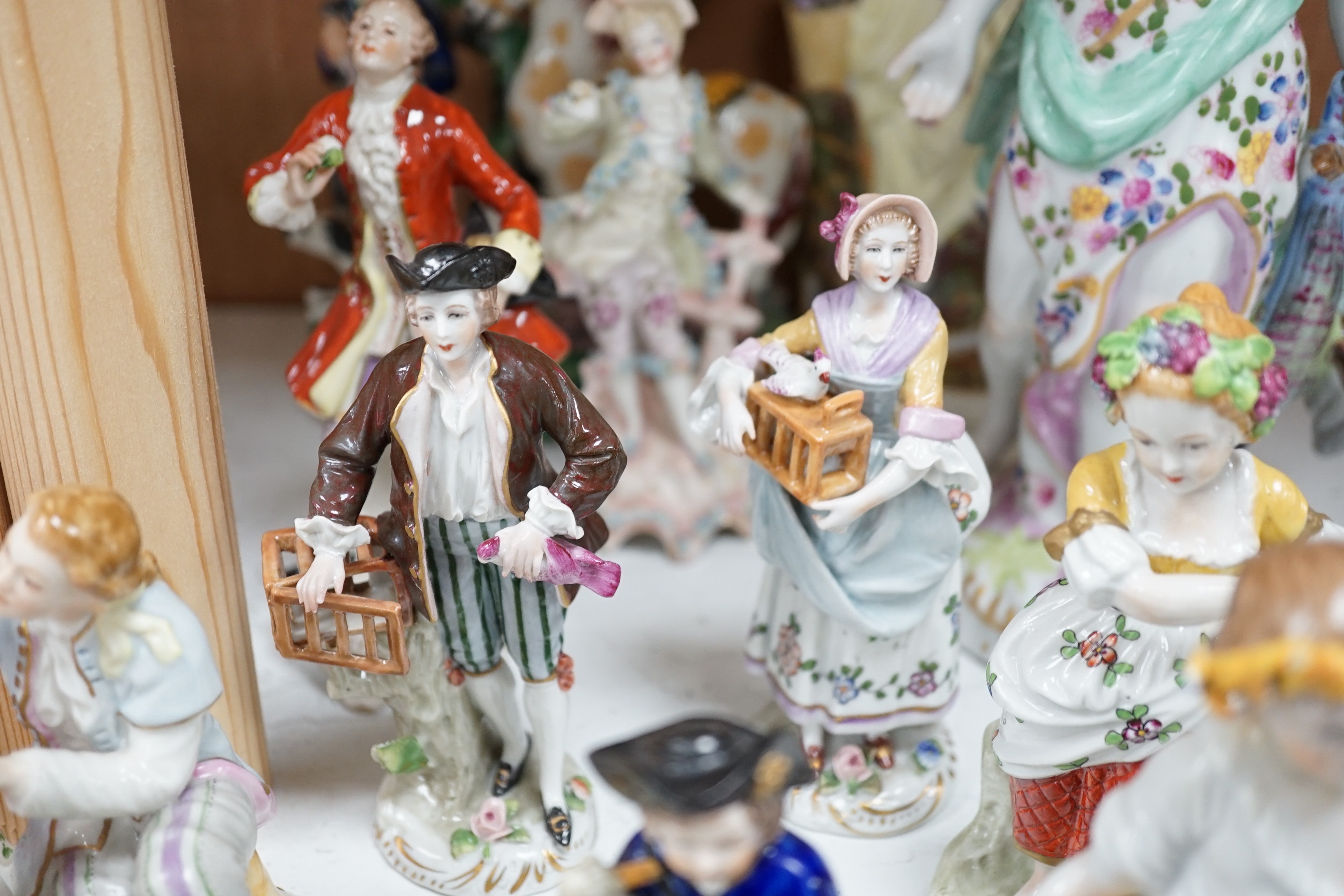 A mixed selection of 20th century porcelain figures, tallest 27cm